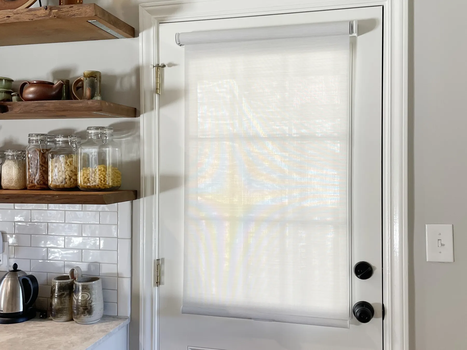 Roller shade on a kitchen door in Seattle, WA