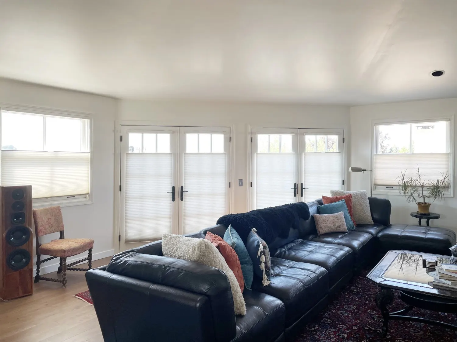 Hunter Douglas Duette honeycomb shades on living room French doors in Seattle, WA