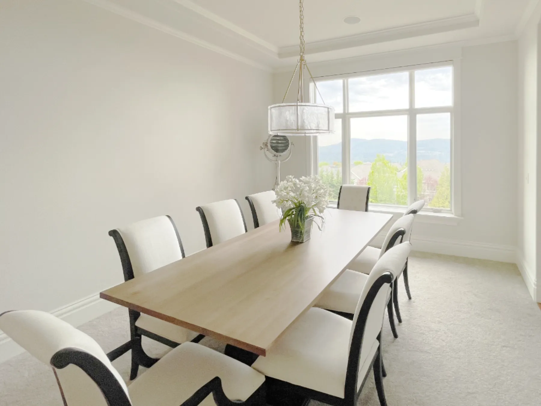 Motorized Silhouette sheer shades raised in an Issaquah dining room