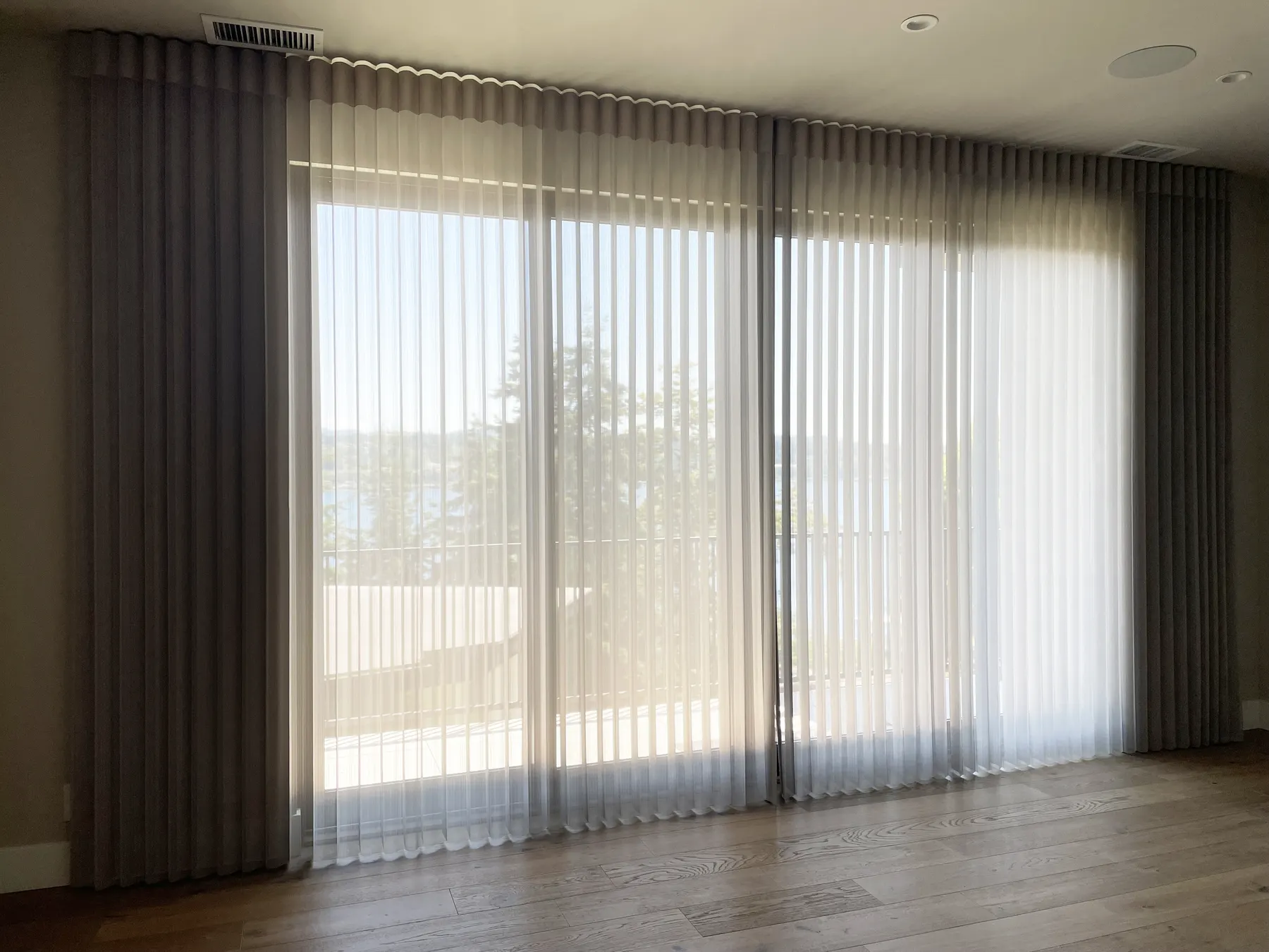 Motorized Luminette Sheers for a Large Bedroom Sliding Door in Mercer Island