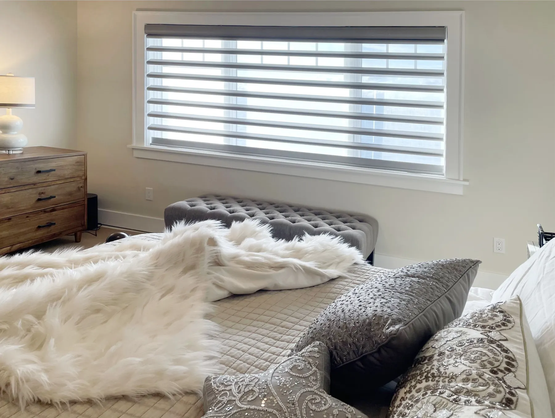 Motorized Pirouette Sheer Shades for a Primary Bedroom in Shoreline Waterfront Home