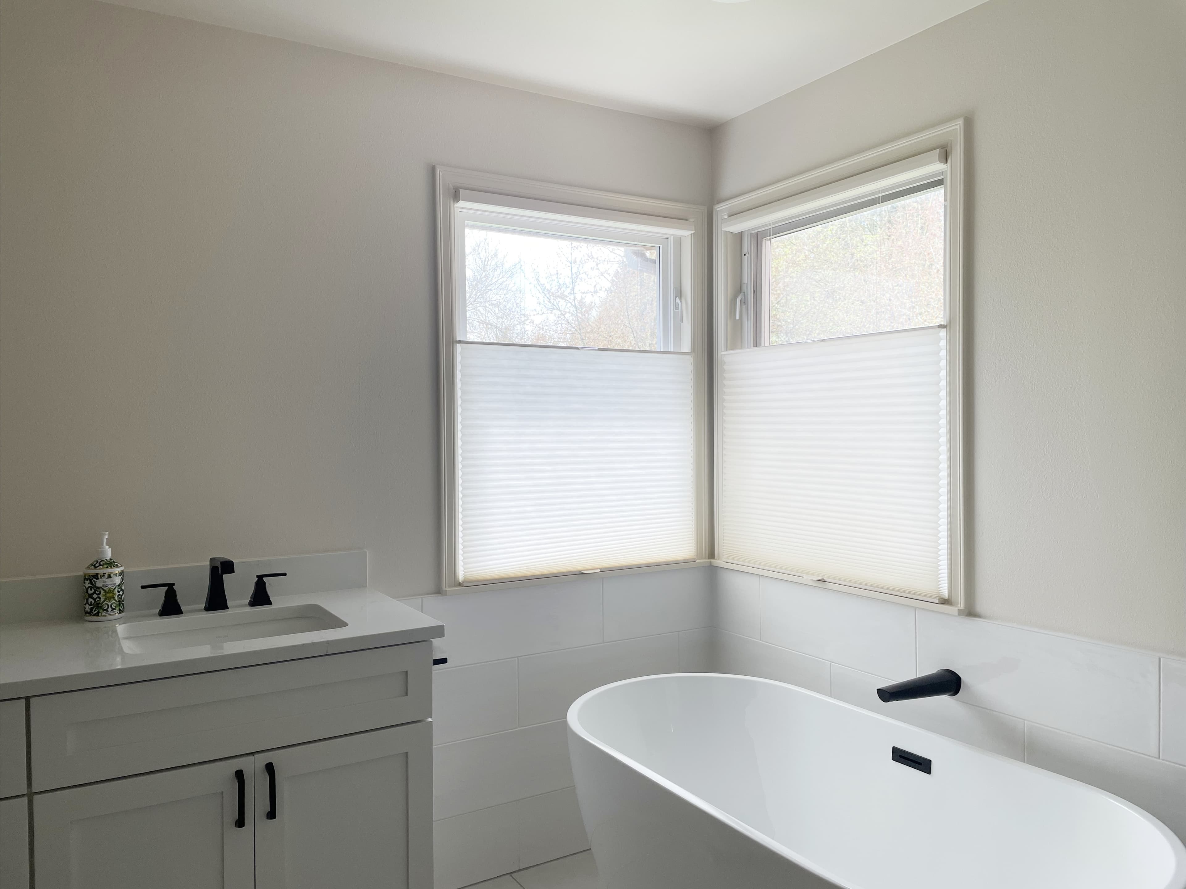 Top-down-bottom-up honeycomb shades in a Sammamish primary bathroom