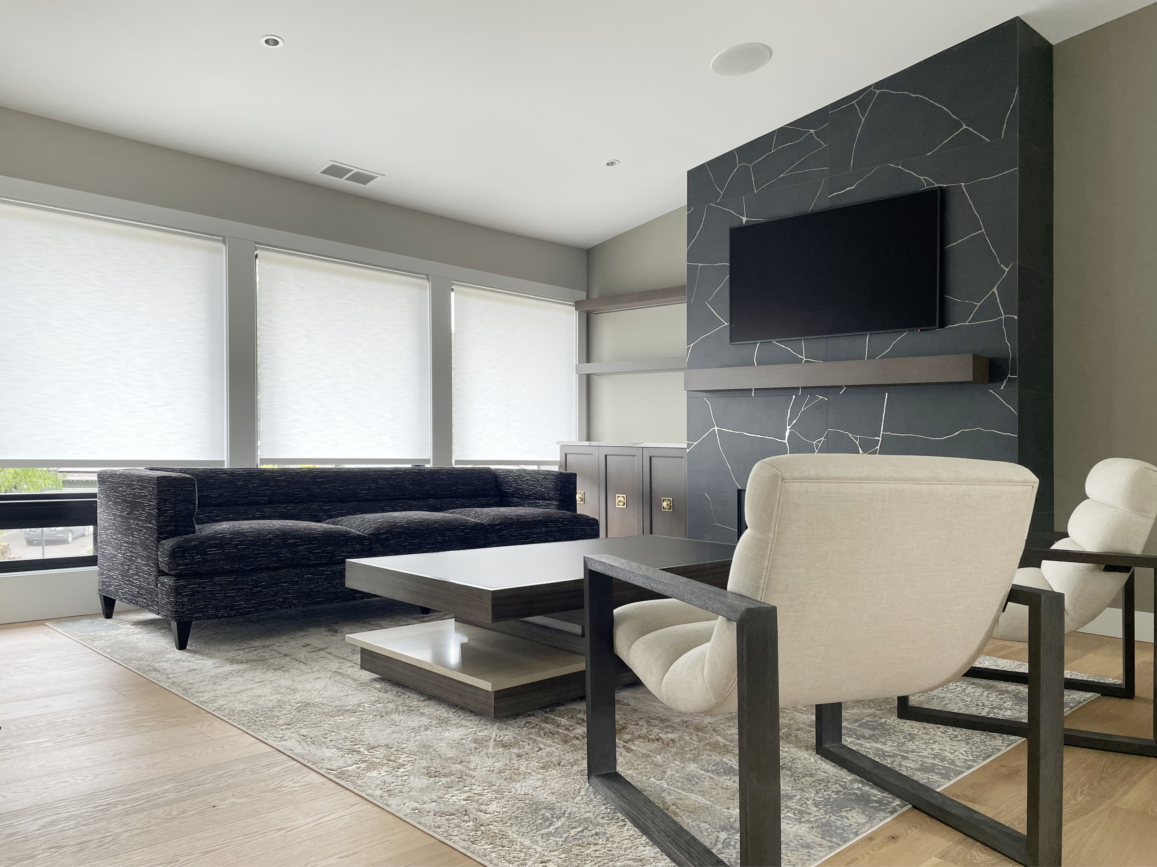 Motorized roller shades installed in a Redmond living room