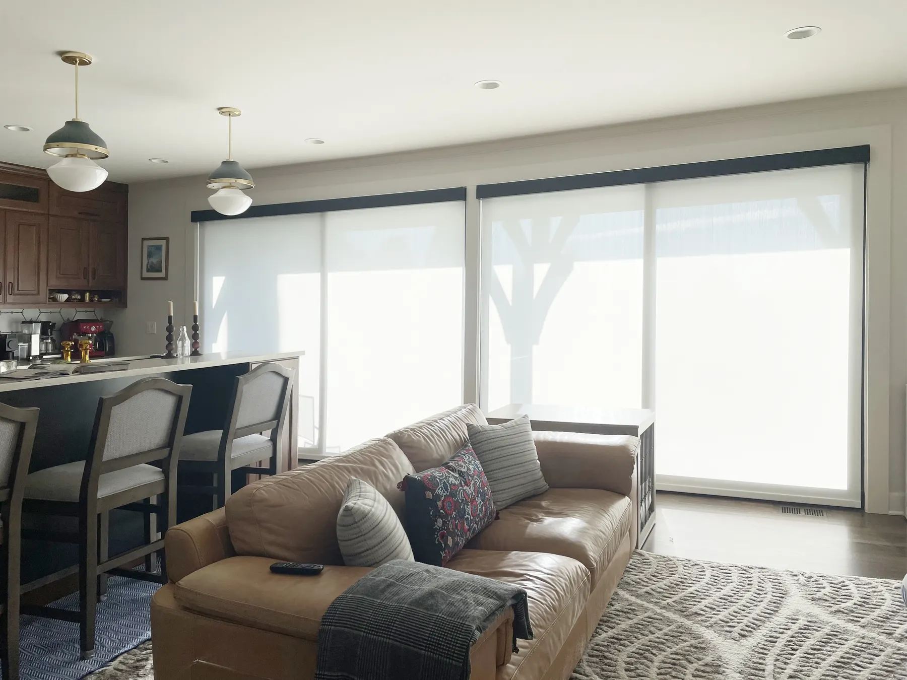 Motorized solar shades on sliding doors in a Seattle kitchen